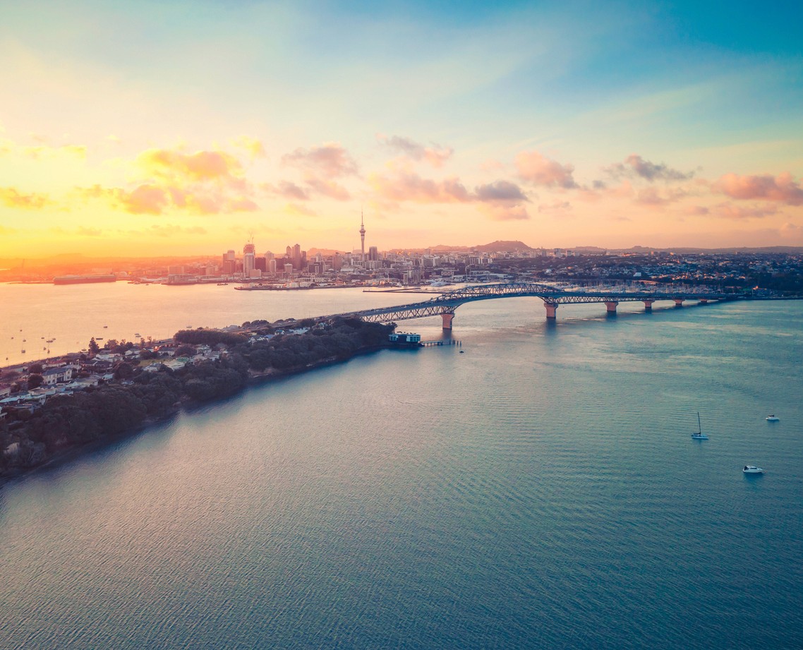 Aerial landscape view of a large body of water in front of a city skyline